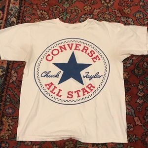 Slightly used white Converse tee shirt